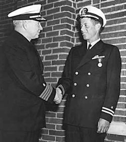 June 12, 1944 - Captain Conklin presents the Navy and Marine Corps medal for Gallantry in Action to Lt. John F. Kennedy during a simple ceremony at Chelsea Naval hospital in Massachusetts. Jack had also received the Purple Heart.