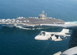 At sea with USS John F. Kennedy CV 67 Mar. 17, 2002: Two S-3B Vikings of VS-31 prepare to return aboard ship after completing combat missions in support of Operation Enduring Freedom. U.S. Navy photo by: Lt. Cmdr. Gerald D. Murphy.