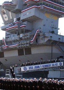 Sailors take their final walk down the brow of USS John F. Kennedy (CV 67) during the decommissioning ceremony. U.S. Navy photo by Mass Communication Specialist 2nd Class Susan Cornell.